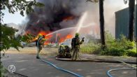 Grote uitslaande brand in loods met elektrische scooters
