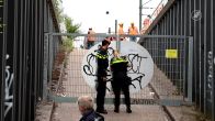 Politie onderzoekt spoor in Amsterdam na brand