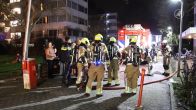Appartementen ontruimd na brand in Leiden: bewoners met ladderwagen gered