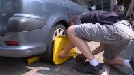 Direct wielklem bij parkeerbon voor Fransen en Polen in Amsterdam