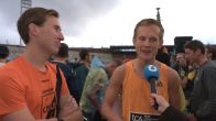 Renners in de regen bij de marathon van Amsterdam